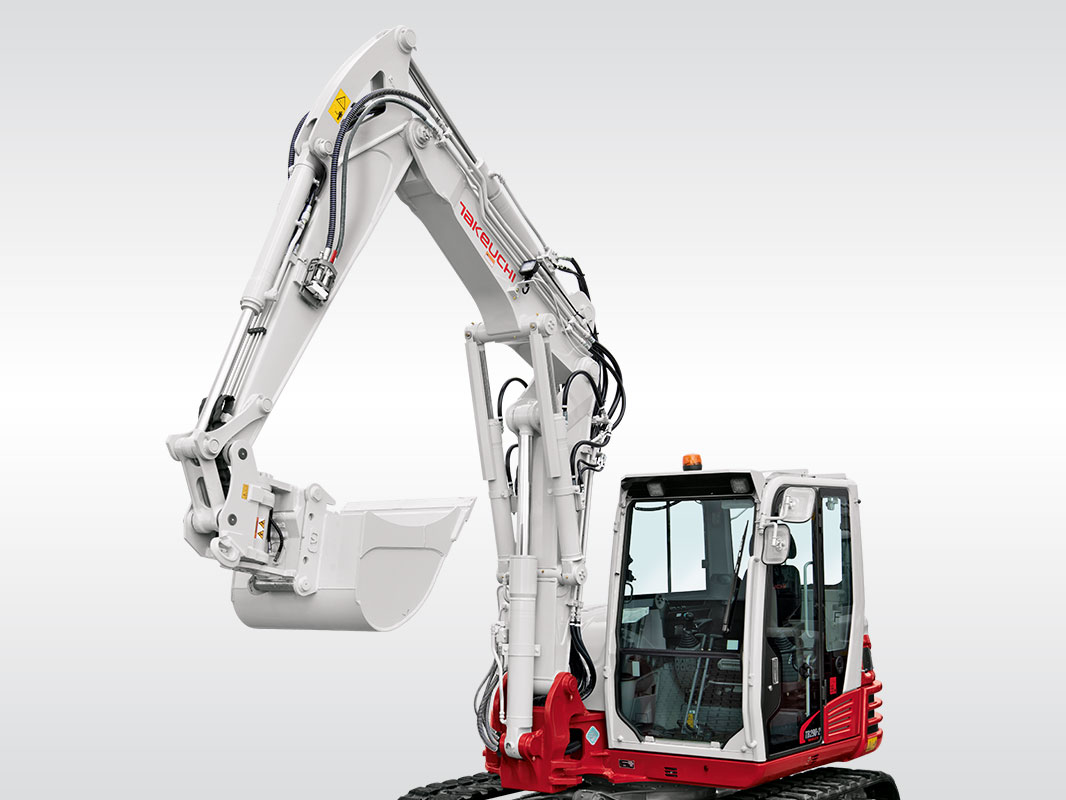Rot-weißer Takeuchi Bagger TB 290-2 mit Kettenfahrwerk, seitlich von links fotografiert