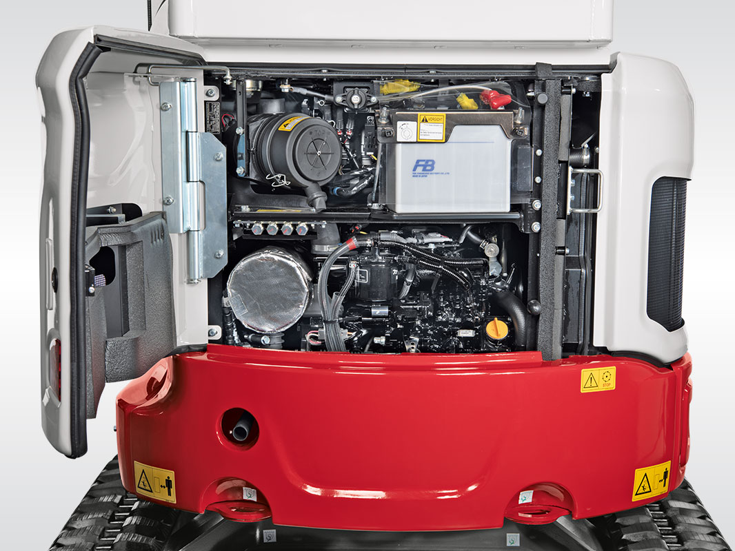 Heckansicht des Takeuchi Baggers TB 325 mit geöffnetem Servicezugang