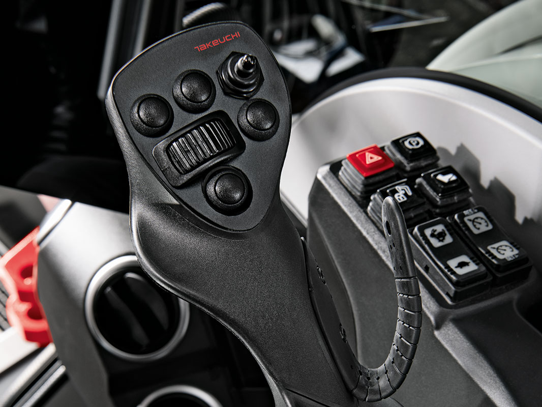 Detailaufnahme des rechten Joysticks mit Handauflage, Knöpfen und Wippe