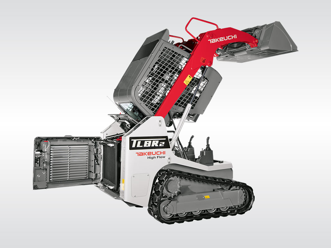 Takeuchi TL 8 R2 mit geöffneter Heckklappe und nach oben gekippter Kabine