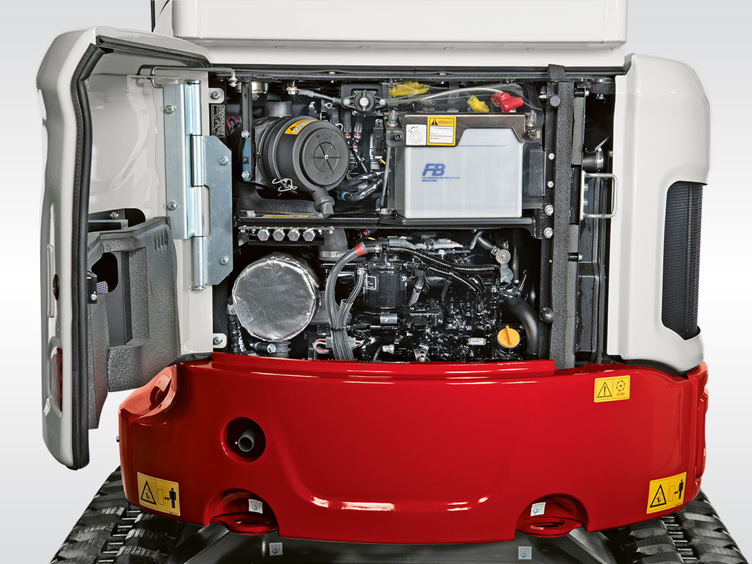 Heckansicht des Takeuchi Baggers TB 325 mit geöffnetem Servicezugang